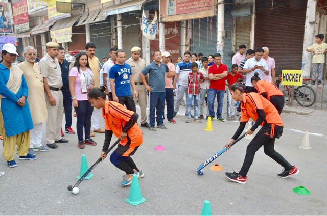 To promote gender equality, women and girls participated in different sporting events, including hockey. Photo by Deputy Commissioners Office, Jhajjar, India