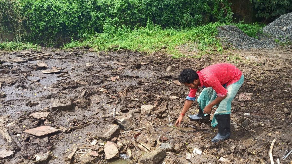 Clearing debris at the Edward Memorial School while preparing site for Kawaki.