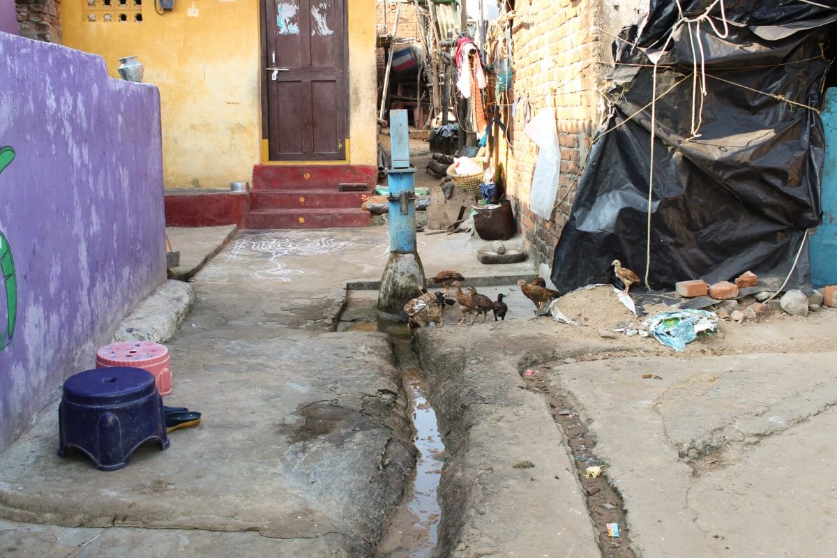 Water draining from hand pump.