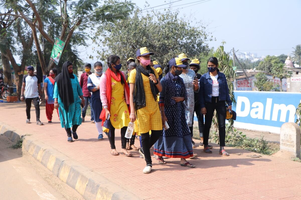 Adolescents taking a stroll on the street to identify what constitutes Safe, Vibrant and Healthy Public spaces.