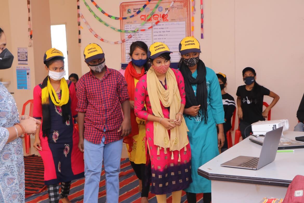 Adolescents engaged in sharing learnings and feedback using digital mediums. Photo by WRI India.