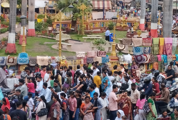 Crowd gathers in an urban space