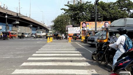 Motorists comply with the stop line and pedestrian crossing painted during the trial of the Oberoi Mall junction in Mumbai. 