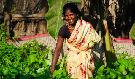 A woman tending to her nutri-garden.