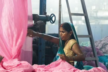 Woman works in textile factory