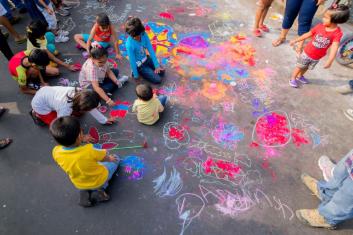 Children painting on the streets in Kolkata, India. Photo by Rudra Narayan Mitra/Shutterstock.