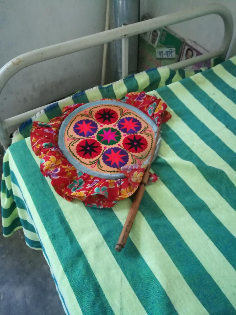 Handheld Pankhas (fans), the only respite from the sweltering heat