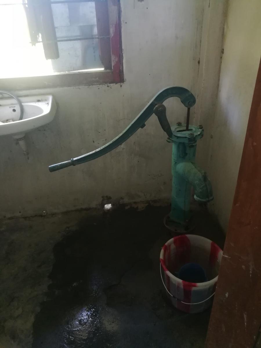 Ramhari char Subcenter: Handpump inside the kitchen for easy access.